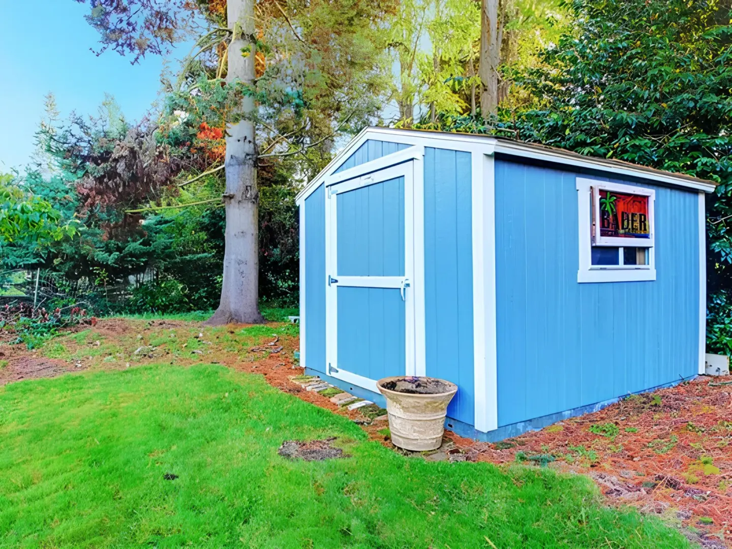 blue-small-backyard-shed-with-trees-on-the-back-in-southern-maryland