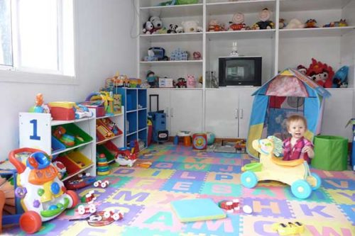 Finished basement with kids playroom