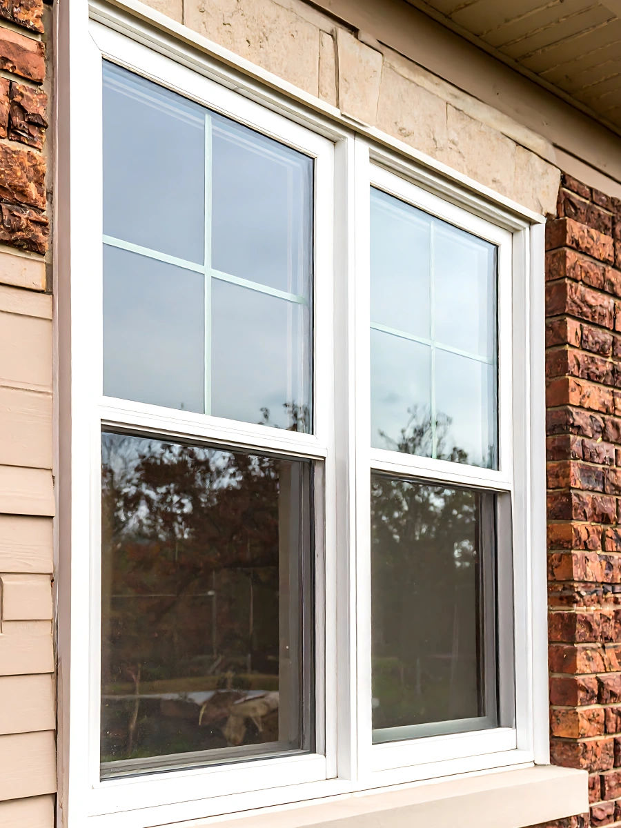 exterior-white-trim-window-installation-on-the-brick-house-in-huntingtown-maryland