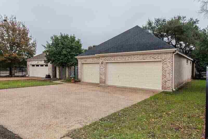 free-standing-two-garage-installation-on-the-park-place-surrounded-by-grass-trees-on-the-background-in-huntingtown-maryland