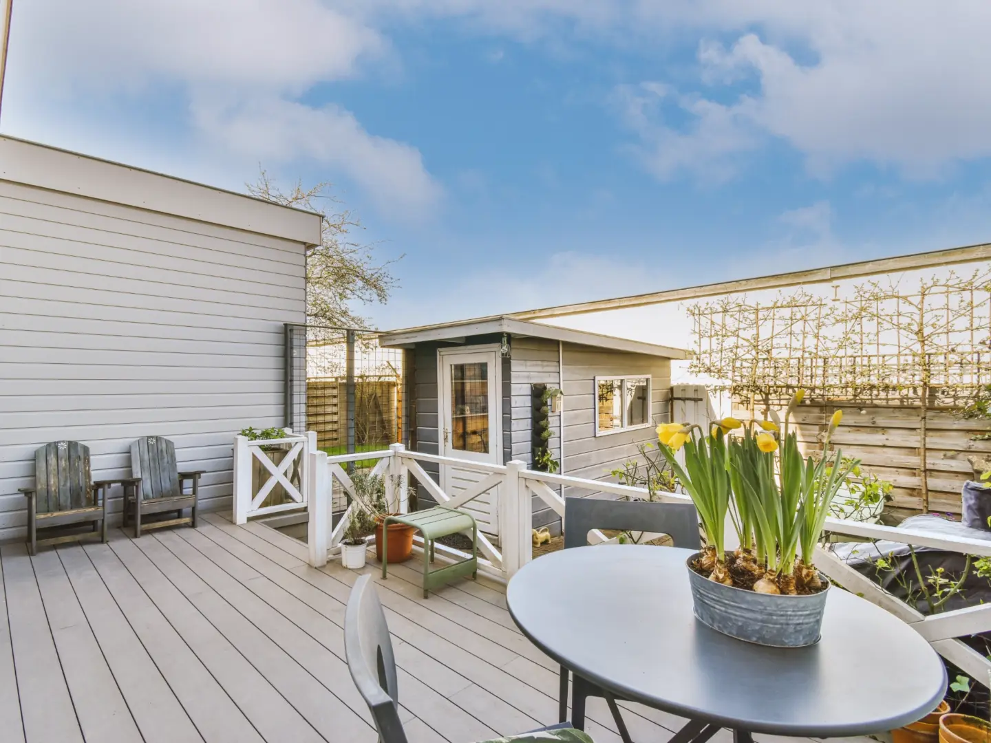 neat-patio-with-sitting-area-on-the-custom-residential-deck-with-garden-and-home-addition-in-huntingtown-maryland