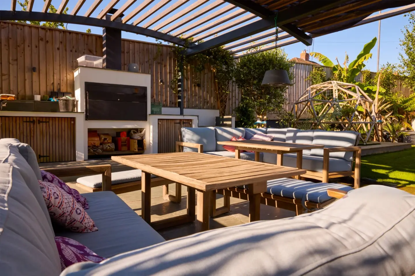 outdoor-living-area-with-fire-place-and-garden-of-modern-house-in-southern-maryland