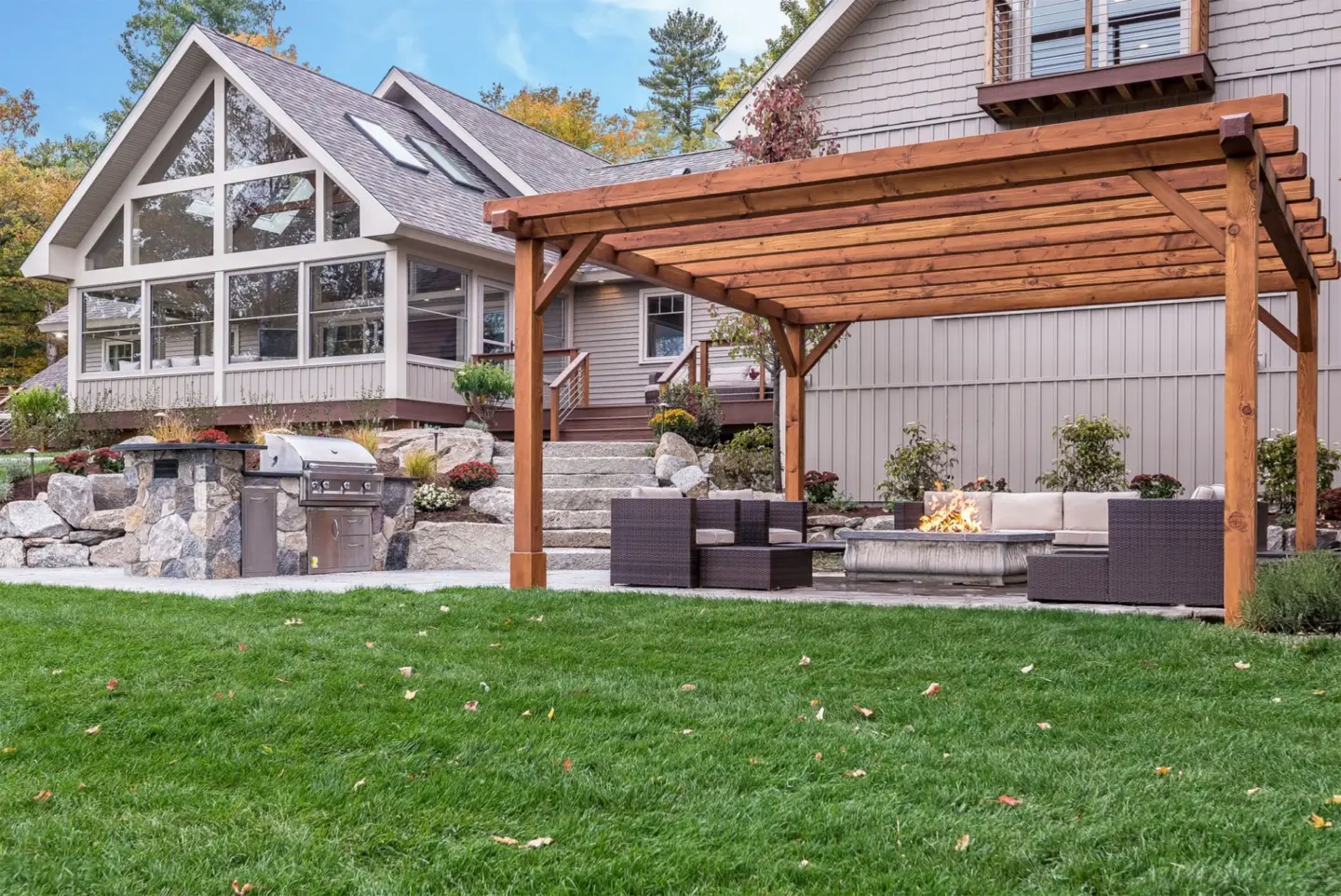 pergola-on-the-outdoor-living-space-with-fire-place-and-screened-in-porch-on-the-commercial-house-with-cable-railing-in-southern-maryland