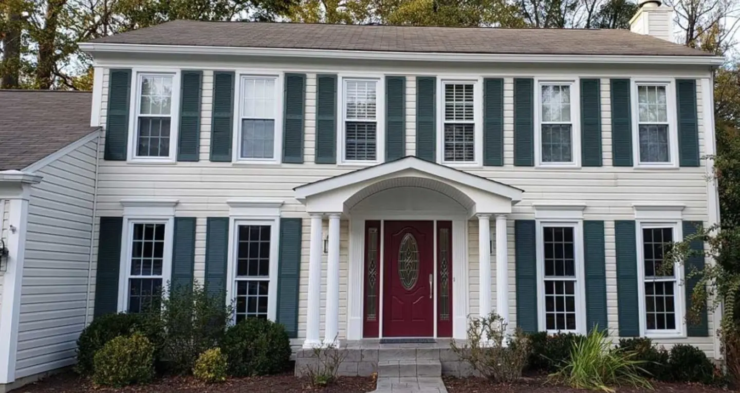 siding-installation-on-the-modern-house-with-multiple-windows-and-chimney-in-huntingtown-maryland